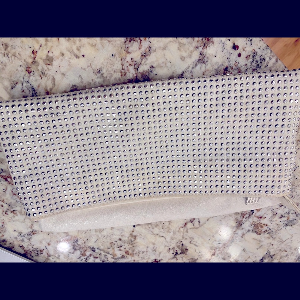 BCBG white clutch. Very Blingy! Gently used.